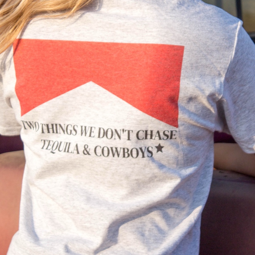 Gray “Two things we don’t chase tequila and cowboys”  t-shirt